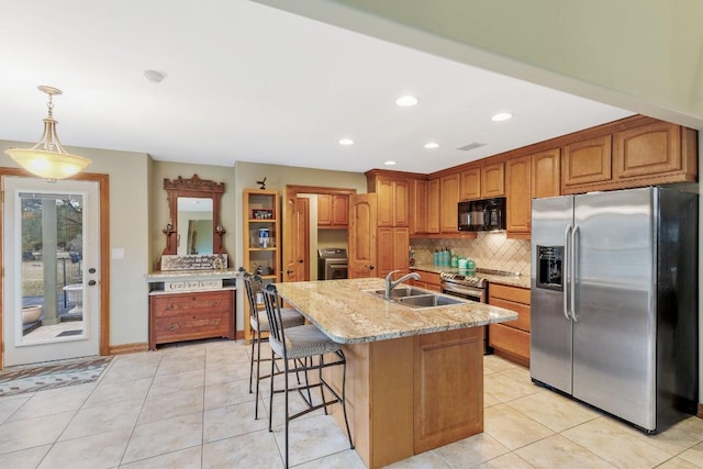 2900 Hi Mesa, Horseshoe Bay, TX 78657 - kitchen with light tile patterned flooring, tasteful backsplash, appliances with stainless steel finishes, and a sink