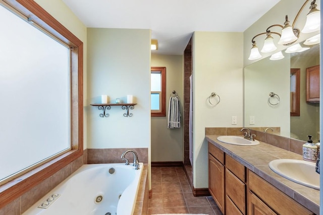 2900 Hi Mesa, Horseshoe Bay, TX 78657 - full bathroom featuring double vanity, a jetted tub, tile patterned flooring, and a sink