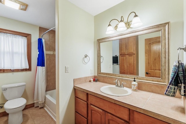 2900 Hi Mesa, Horseshoe Bay, TX 78657 - full bathroom featuring toilet, baseboards, tile patterned floors, vanity, and shower / bathtub combination with curtain
