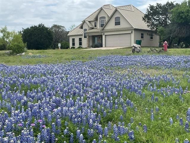 2900 Hi Mesa, Horseshoe Bay, TX 78657 - craftsman-style home with stucco siding and a garage