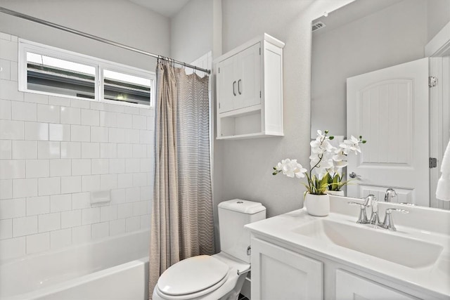 full bath featuring toilet, shower / bath combo, visible vents, and vanity