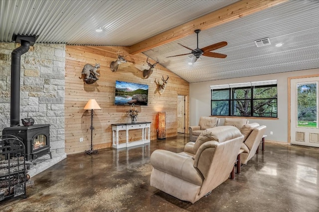 542 Stars And Stripes, Fischer, TX 78623 - living area with a ceiling fan, baseboards, visible vents, wood walls, and concrete flooring