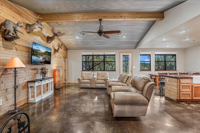 542 Stars And Stripes, Fischer, TX 78623 - living area with ceiling fan, plenty of natural light, and concrete floors