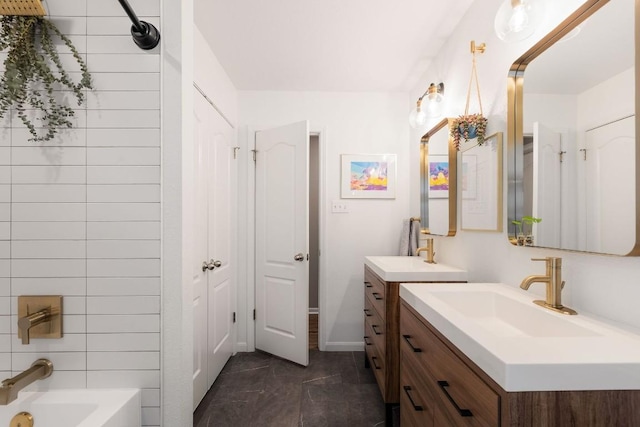 full bathroom featuring shower / tub combination, two vanities, and a sink