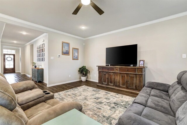 1330 Logan Blvd, Salado, TX 76571 - living area with a ceiling fan, crown molding, dark wood-type flooring, and baseboards