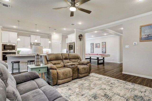 1330 Logan Blvd, Salado, TX 76571 - living room featuring pool table, ceiling fan, dark wood-type flooring, baseboards, and ornamental molding
