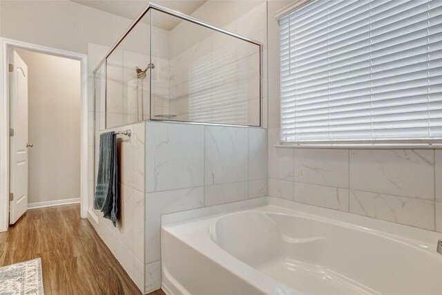 1330 Logan Blvd, Salado, TX 76571 - bathroom with a garden tub and tiled shower