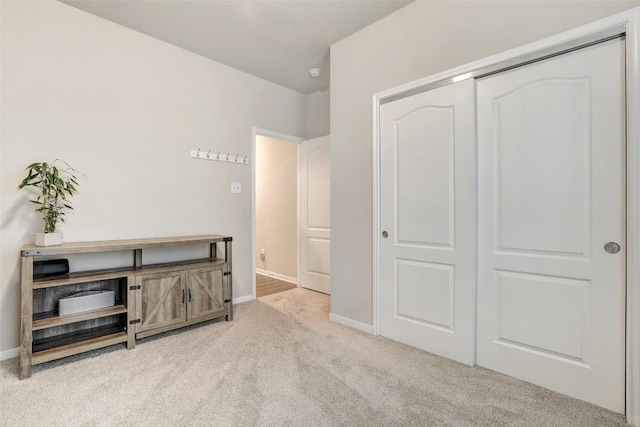 1330 Logan Blvd, Salado, TX 76571 - unfurnished bedroom featuring light colored carpet, a closet, and baseboards