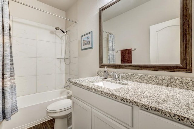 1330 Logan Blvd, Salado, TX 76571 - bathroom featuring toilet, vanity, wood finished floors, and shower / bathtub combination with curtain
