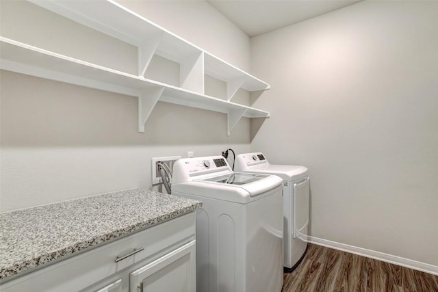 1330 Logan Blvd, Salado, TX 76571 - clothes washing area featuring washing machine and clothes dryer, dark wood-style floors, and baseboards