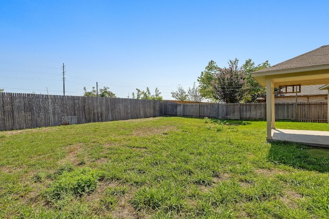 view of yard featuring a fenced backyard