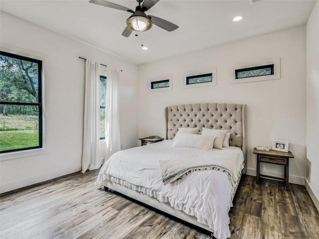 bedroom featuring recessed lighting, ceiling fan, baseboards, and wood finished floors