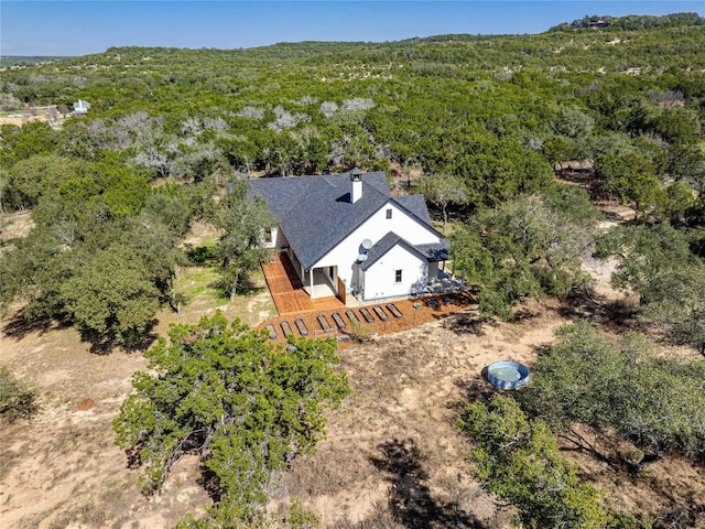 aerial view with a wooded view