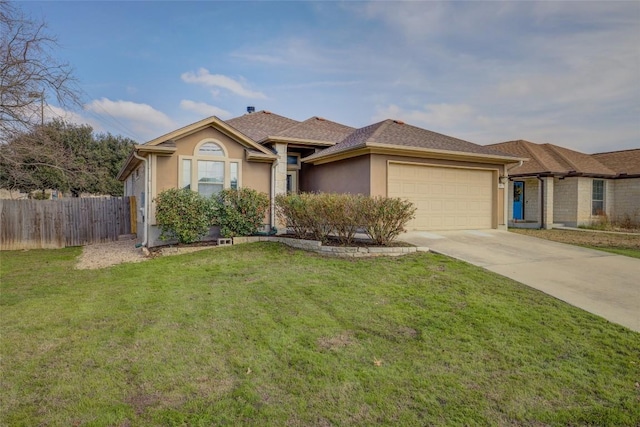 view of front of home featuring driveway, a garage, stucco siding, fence, and a front yard