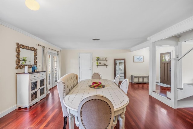 4608 Arapahoe Trl, Austin, TX 78745 - dining room with dark wood finished floors, stairway, crown molding, and french doors