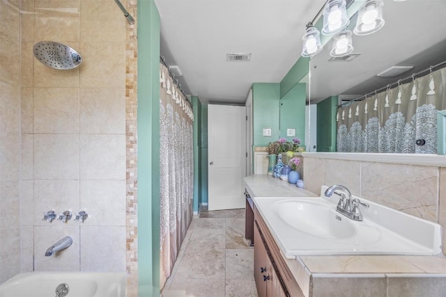 full bath featuring vanity