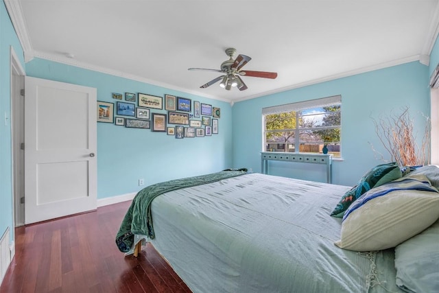 4608 Arapahoe Trl, Austin, TX 78745 - bedroom featuring wood finished floors, ornamental molding, and a ceiling fan