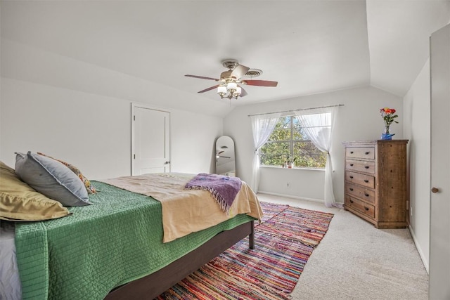 4608 Arapahoe Trl, Austin, TX 78745 - bedroom featuring light carpet, a ceiling fan, and vaulted ceiling