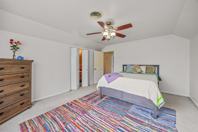 bedroom with light carpet, vaulted ceiling, baseboards, and ceiling fan