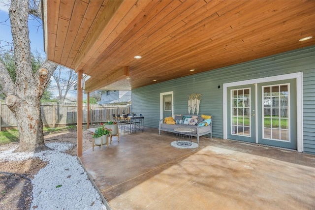4608 Arapahoe Trl, Austin, TX 78745 - view of patio with outdoor dining area, outdoor lounge area, and french doors