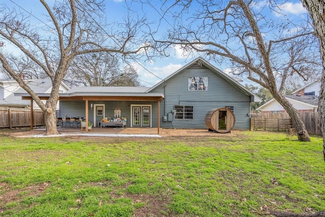 4608 Arapahoe Trl, Austin, TX 78745 - back of house featuring a fenced backyard and a patio area
