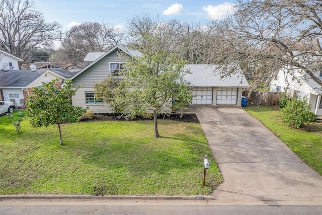 4608 Arapahoe Trl, Austin, TX 78745 - view of front facade featuring a garage and driveway