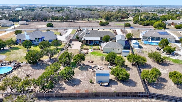 birds eye view of property with a residential view