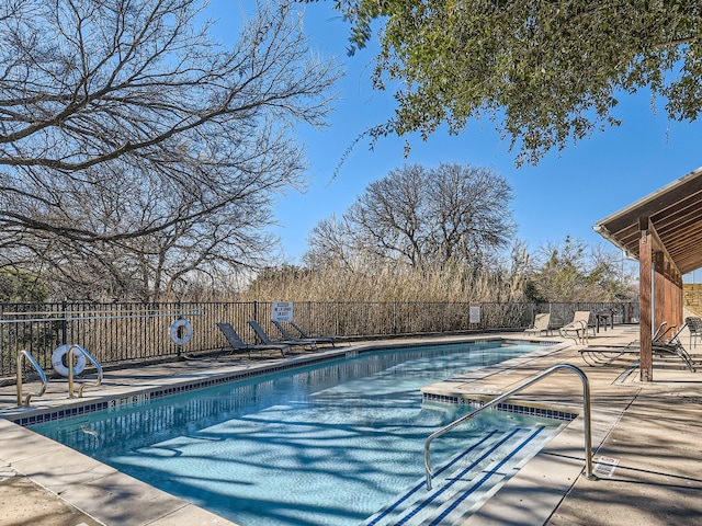 1201 Grove Blvd Unit 2803, Austin, TX 78741 - community pool with a patio area