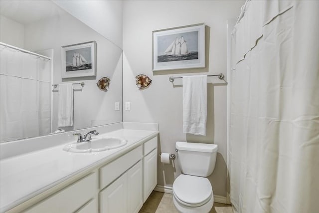 full bathroom with toilet, tile patterned flooring, vanity, and baseboards