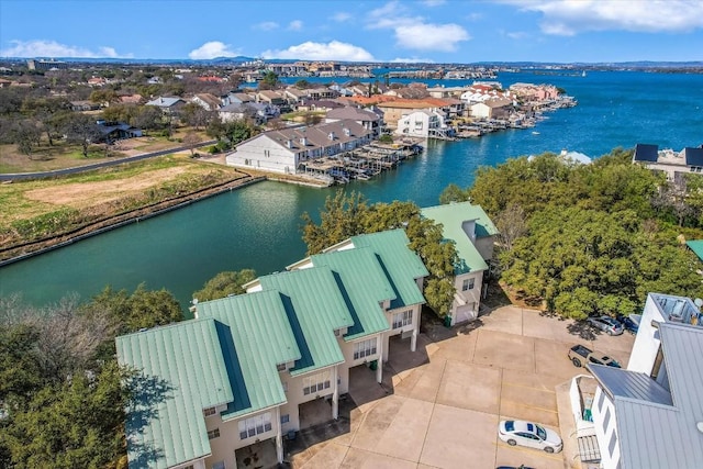 aerial view with a water view and a residential view