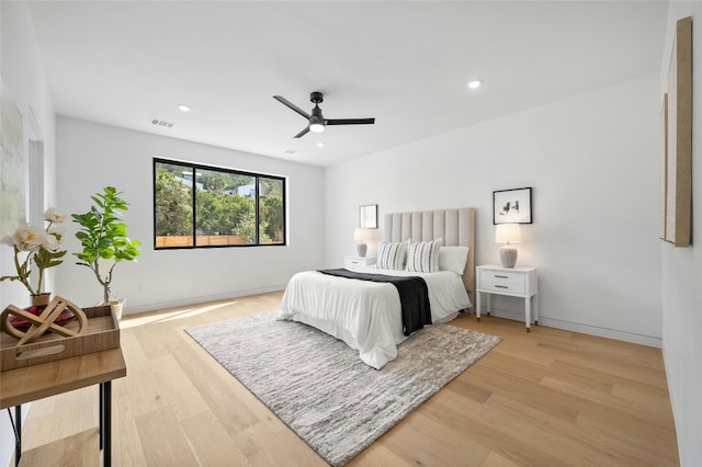 bedroom featuring recessed lighting, baseboards, and light wood finished floors