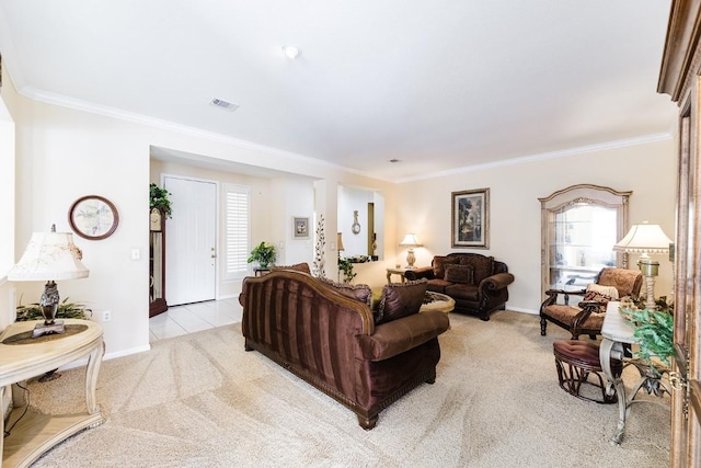 living room featuring baseboards, visible vents, crown molding, and light colored carpet