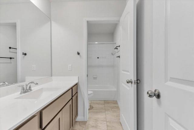 bathroom featuring  shower combination, marble finish floor, vanity, and toilet