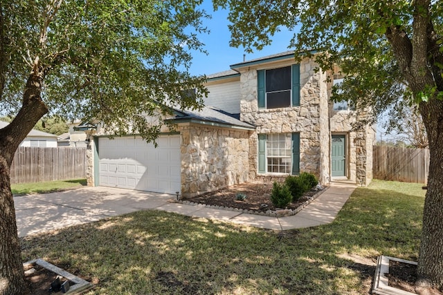 traditional home featuring stone siding, fence, driveway, and an attached garage