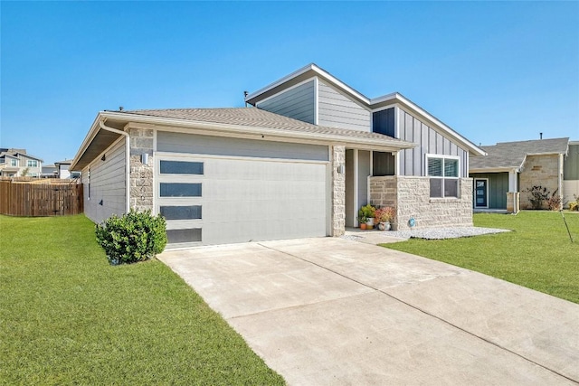 mid-century home featuring board and batten siding, stone siding, fence, and a garage