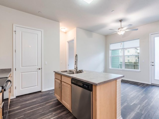 kitchen with light brown cabinets, a kitchen island with sink, a sink, light countertops, and stainless steel dishwasher