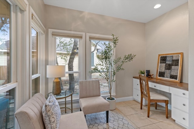 office space featuring light tile patterned floors, baseboards, and recessed lighting