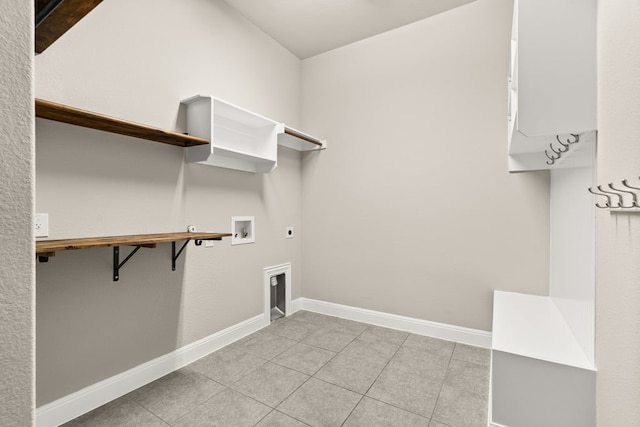 3809 Alpine Ridge Cv, Leander, TX 78641 - washroom featuring hookup for an electric dryer, washer hookup, and light tile patterned floors