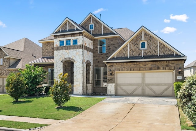 view of front facade featuring metal roof, brick siding, concrete driveway, a front lawn, and a standing seam roof