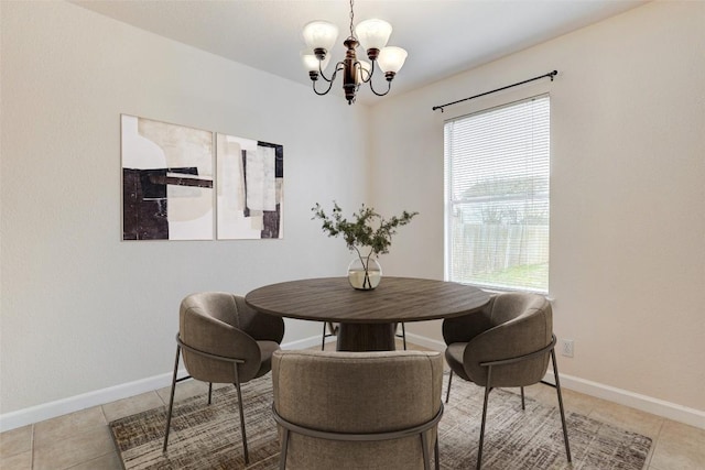 5006 Daymon Ct, Hutto, TX 78634 - dining room featuring a chandelier and tile patterned floors
