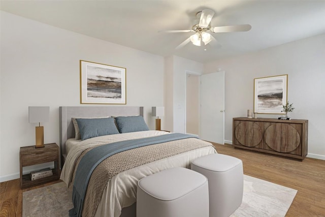 5006 Daymon Ct, Hutto, TX 78634 - bedroom with wood finished floors and ceiling fan