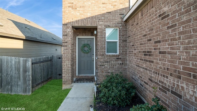 6205 Conestoga Wagon Way, Del Valle, TX 78617 - entrance to property featuring brick siding