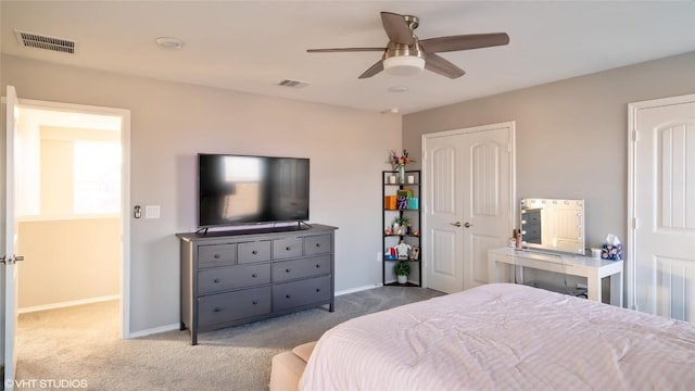 6205 Conestoga Wagon Way, Del Valle, TX 78617 - carpeted bedroom featuring baseboards and a ceiling fan