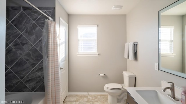 6205 Conestoga Wagon Way, Del Valle, TX 78617 - bathroom featuring vanity, toilet, and baseboards