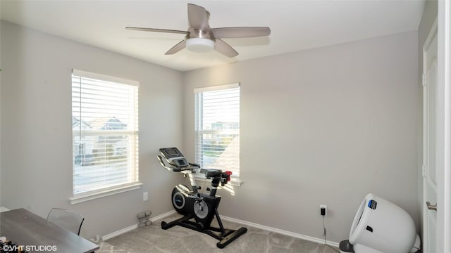 6205 Conestoga Wagon Way, Del Valle, TX 78617 - exercise area with carpet floors, baseboards, and ceiling fan