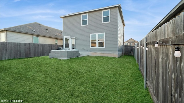 6205 Conestoga Wagon Way, Del Valle, TX 78617 - back of house with an outdoor living space