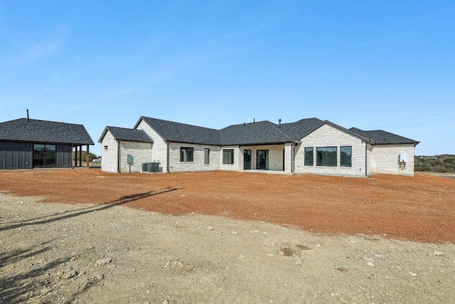 view of front of property featuring cooling unit