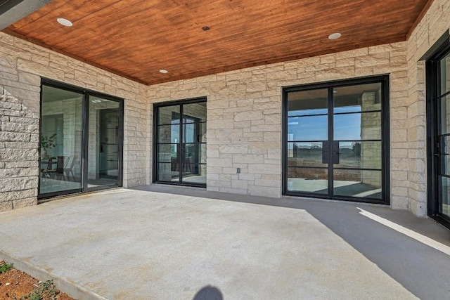 138 Cloudwood Ranch Rd, Briggs, TX 78608 - view of patio featuring french doors