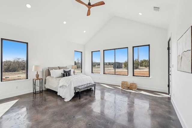 bedroom with concrete flooring, high vaulted ceiling, visible vents, and baseboards