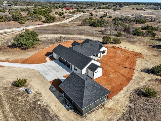 birds eye view of property featuring a rural view